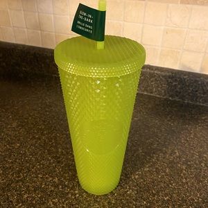 Starbucks 2022 studded lemongrass Glow-in-the-Dark 24oz cup with straw and lid.